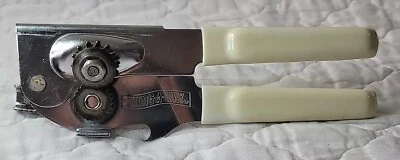 Abridor de latas y botellas oscilante vintage hecho en EE. UU. Cubierta de mano con mango de marfil Foto 1 de 4