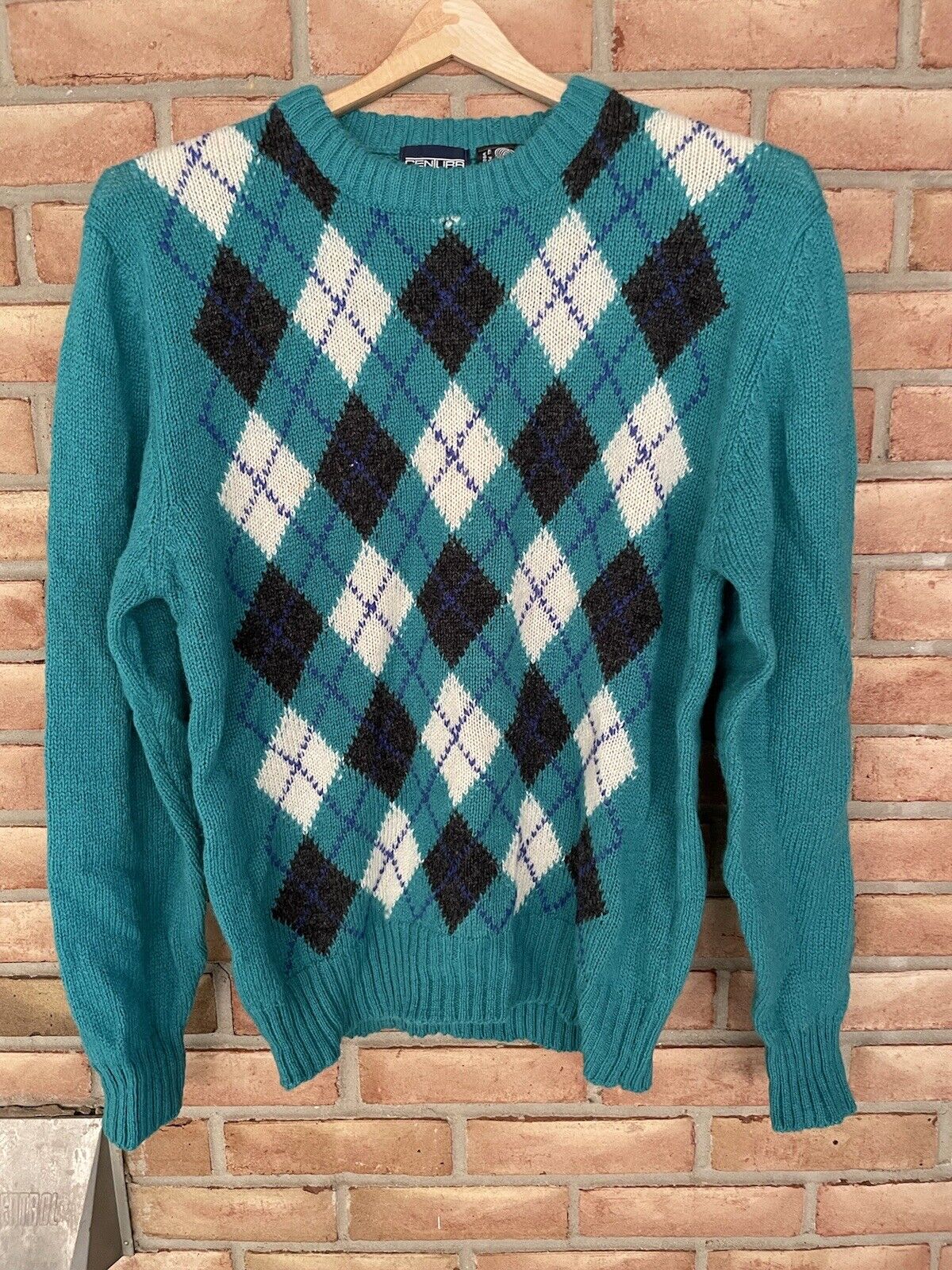 Women's 100 percent Wool sweater made in New Zealand marked size 