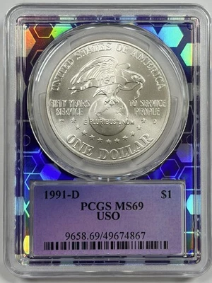 1991-D USO U.S.O Silver Commemorative Dollar MS69 PCGS Trader Bea Purple Core - Image 1 of 2