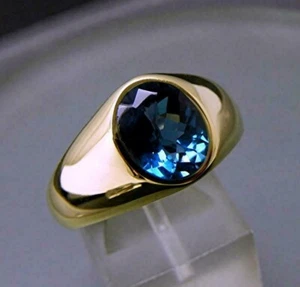 4 Ct Oval Cut Simulated London Blue Topaz Ring In 14k Yellow Gold Plated Silver