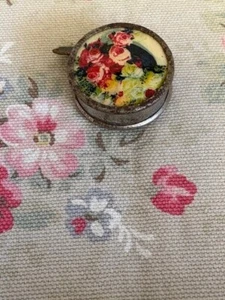 Ancien ruban à mesurer rétractable motif floral sur le dessus - Photo 1/3