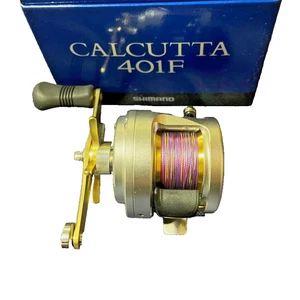 Carrete de baitcasting izquierdo Shimano Calcutta F 401F casi nuevo con caja de Japón - Imagen 1 de 8