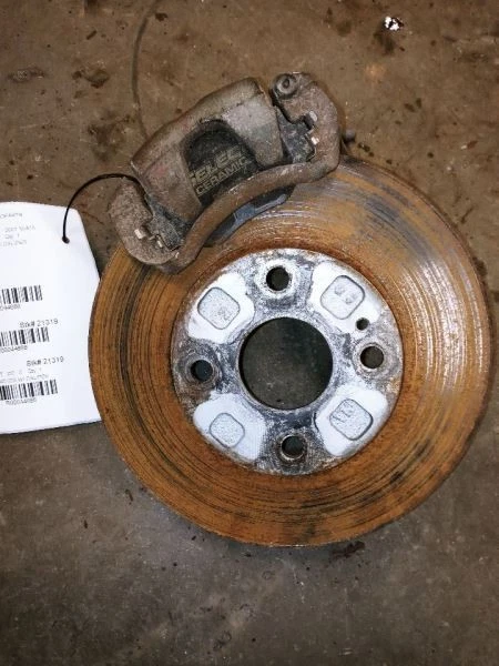 Rotor de freno delantero derecho pasajero Mazda Miata 2001 con pinza 10" fabricante original usado  Foto 1 de 4