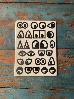 IKEA Glodande Walter Van Beirendonck Brillante Ojos Blancos y Negros Arte Pop Trivet Foto 1 de 4