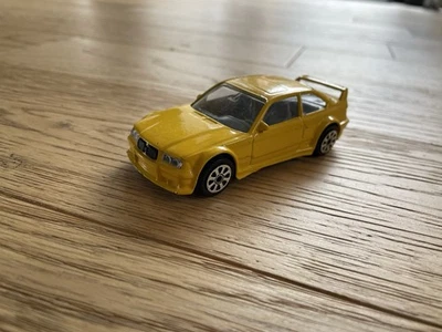 Coche clásico Burago amarillo BMW M3 con escala 1/43 Foto 1 de 4