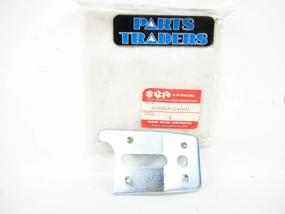 Soporte de almohadilla de estribo delantero izquierdo genuino Suzuki Cavalcade 1400 1986-1988 NOS Foto 1 de 1