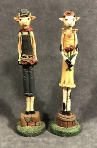 Jim Shore 4105 & 4104  Cow Pencil Figures Boy w Train & Girl w Flowers - Picture 1 of 9