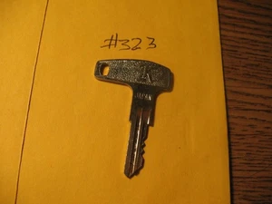 NEW NOS GENUINE KAWASAKI PRE CUT KEY # 323 G3 G4 F5 F8 KH100 (K-6470) - Picture 1 of 2