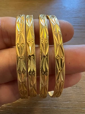 ¡¡60,8 gramos!! Juego de cuatro (4) brazaletes indios vintage de oro 21,5-21,8K Foto 1 de 4