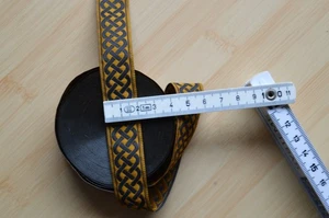 Borte in ocker und schwarz - Bild 1 von 3