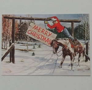 Letrero colgante de vaquero de Feliz Navidad árbol inclinado 7X4,5" tarjeta Vic Donahue 1674 - Imagen 1 de 6