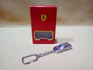 FERRARI MASSSTAB 1:87 METALL SCHLÜSSELANHÄNGER FARBE SILBER BURAGO MADE IN ITALY - Bild 1 von 1