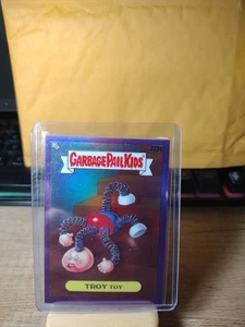 2023 Topps Garbage Pail Kids Chrome Series 6 TROY TOY 222a Purple Refractor /250 - Picture 1 of 2