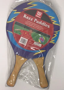 Wilson Razz Paddles Nuevo en Paquete Playa Parque Patio Trasero 2 Palas y 2 Rallyball NUEVO - Imagen 1 de 2