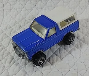 Hot Wheels Ford Bronco 4x4 4 ruedas con ruedas de motocicleta Tri-blade 2 7/8"-74 mm - Imagen 1 de 10