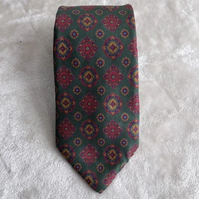 Corbata de seda para hombre Oscar de la Renta verde con patrón geométrico rojo, naranja, azul Foto 1 de 4