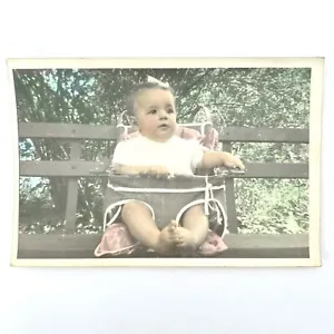 Hand Tinted Vintage Photo Baby Girl In Antique High Chair On Bench Trees C1930 - Picture 1 of 5