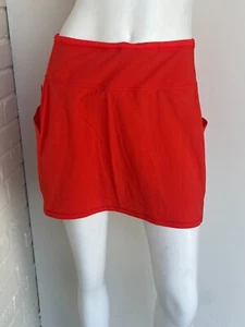 Falda de ocio deportivo Athleta Skort talla pequeña naranja roja - Imagen 1 de 3