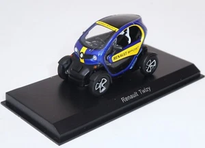 2015 Twizy Renault Sport as compared by Stilrling Moss w his one 1/43 Spark - Picture 1 of 16