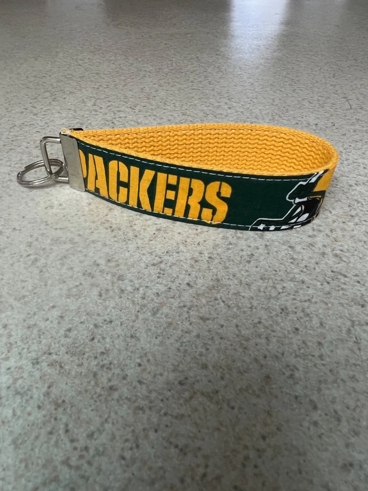 Llavero Llavero - Estilo Muñequera - Green Bay Packers - Patrón de Logo Clásico - NFL Foto 1 de 1