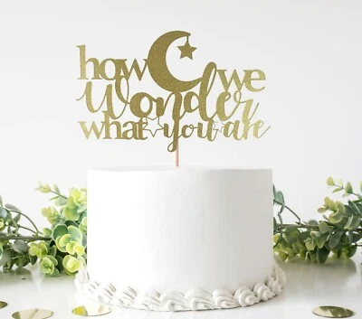 Cómo nos preguntamos qué eres adorno de pastel para fiesta de revelación de género, baby shower Foto 1 de 2