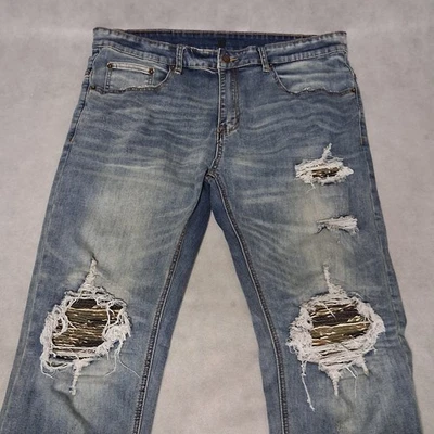 Pantalones de mezclilla azules Young & Reckless 36x33 ajustados lavados ligeros desgastados parche camuflaje Foto 1 de 4