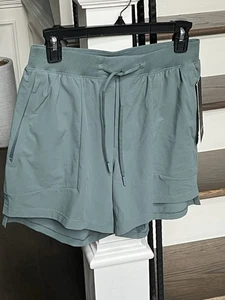 Pantalones cortos verdes activos de tiro alto Lululemon License to Train para hombre 5” L S - Imagen 1 de 4