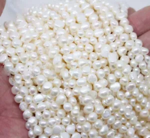 PERLINE SCIOLTE BAROCCHE BIANCHE D'ACQUA DOLCE NATURALI 4-5 MM FILO 15" - Foto 1 di 12