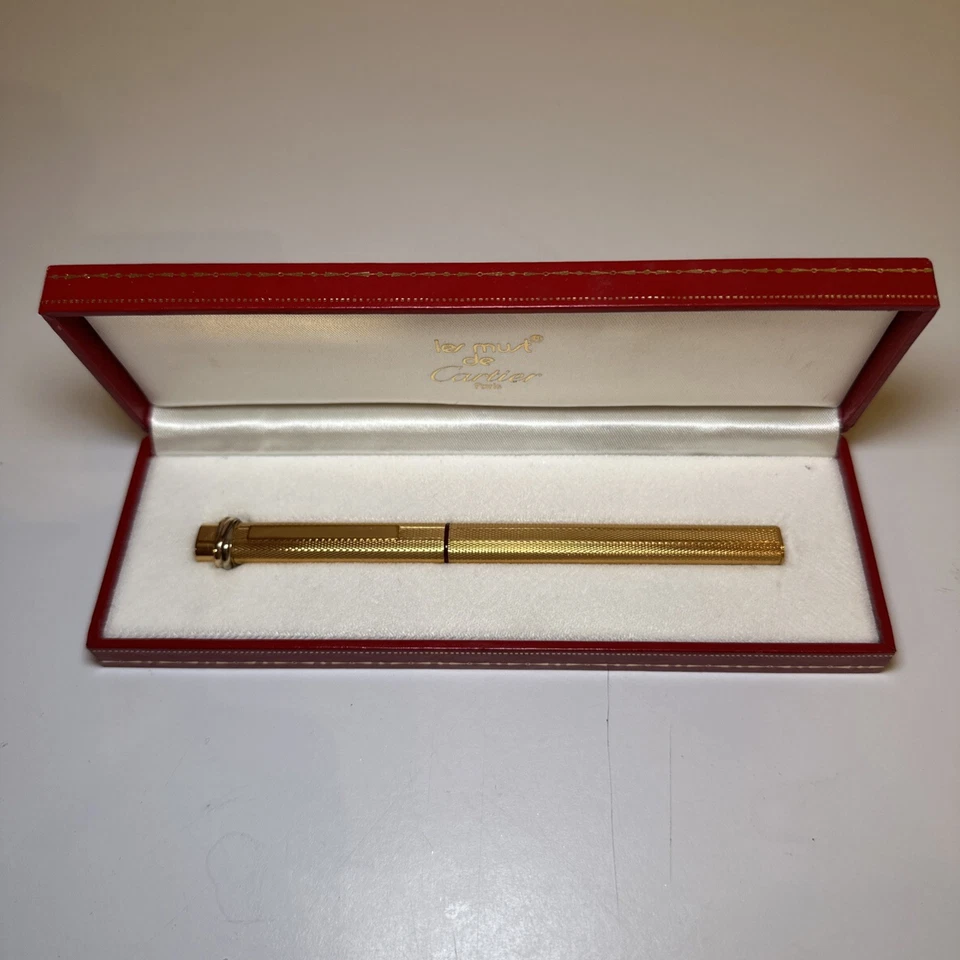 Auténtico bolígrafo Cartier Must de Cartier Trinity Vendome oro 3 anillos con caja Foto 1 de 4