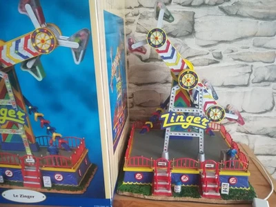 Manège Lemax Zinger lumineux - Carnival Village Noël - ref 84809 - 2008 en boîte - Photo 1/4