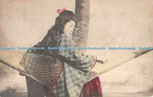 R440869 Japanese girl at the tree Hammock 1913 - Picture 1 of 4