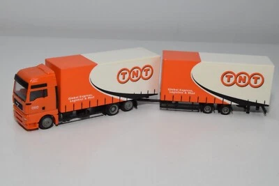 B54 1:87 HERPA MAN TGA TRUCK TRAILER TNT GLOBAL EXPRESS EXC. COND. - Immagine 1 di 4
