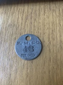 F. M. Tool Check Token - Picture 1 of 2