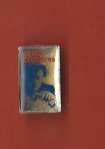 PIN SOLAPA TELÉFONO CONTESTADOR DE TAPONES DE CRIMEN - Imagen 1 de 1