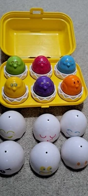 Tomy Hide and Squeak Eggs Activity Toy Egg Box Shape Sorter - Image 1 of 4