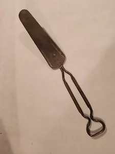Vintage Advertising Stainless Steel Cake Cutter Bottle Opener. Chas. E. Williams - Bild 1 von 5