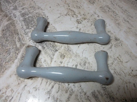 Vintage porcelain enamel over iron industrial door handles. Gray Cover