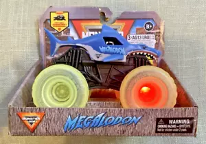RARE Monster Jam 1:43 LIGHT UP MEGALODON Diecast Truck TIRES FLASHING COLORS - Picture 1 of 4