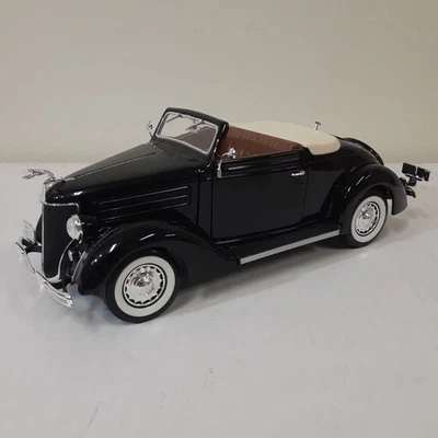 WELLY 1:18 SCALE DIECAST BLACK 1936 FORD DELUXE CABRIOLET CONVERTIBLE  - Image 1 of 4