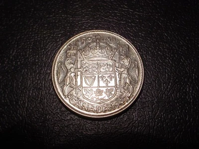 1947 CANADA SILVER 50 CENTS - 7 CURVED RIGHT - NICE GRADE! - Image 1 of 2