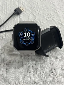Fitbit Versa 2 Activity Tracker With New Grey Sports Band & USB Charger - Picture 1 of 7