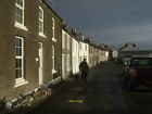 Photo 6x4 One man and his dog Christmas Day 2011 Queen Street Castletown. c2011
