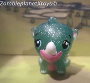 FIGURA DE COLECCIÓN HATCHIMALS AZUL VERDE RINOCERONTE BRILLANTE JARDÍN SUELTO COMO NUEVO - Imagen 1 de 2