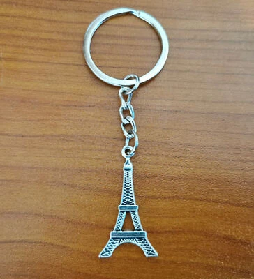 Portachiavi Auto Tour Eiffel Parigi Uomo Donna Portafortuna Vintage Zaino Borsa - Immagine 1 di 2