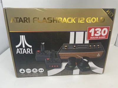 Atari Flashback 12 Gold HDMI Console 130 Classic Games with Joysticks & Paddles - Image 1 of 4
