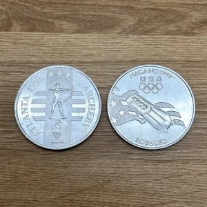 Moneda Olimpiada General Mills Atlanta 1996 Tiro con Arco y Nagano 1998 Bobsled (2 monedas) - Imagen 1 de 5