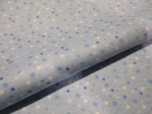 Winzige geworfene blau-weiße Sterne - kuschelnder Flanellstoff BTY - Bild 1 von 4