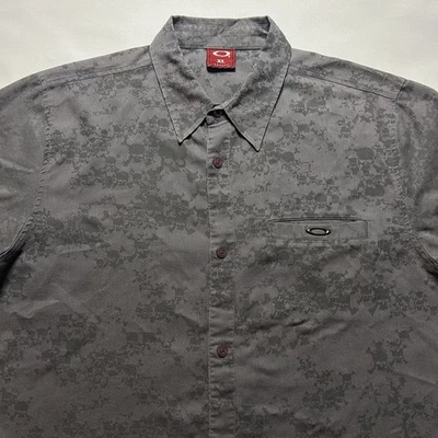 Camisa de Colección Oakley Abotonada Manga Corta Gris Logo Calavera AOP Talla XL Y2K Foto 1 de 4