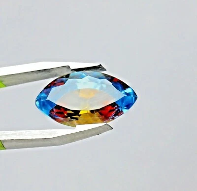 СЕРТИФИЦИРОВАННЫЙ GIE НАТУРАЛЬНЫЙ ДВУХЦВЕТНЫЙ САПФИР ПИТАМБАРИ 9,55 КАРАТА ОГРАНКА МАРКИЗА ДРАГОЦЕННЫЙ КАМЕНЬ - Изображение 1 из 4