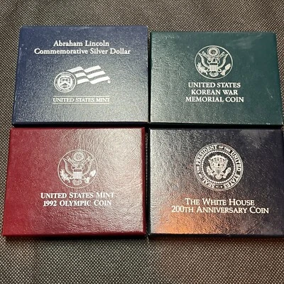 LOT 0F 4 UNCIRCULATED $1 COMMEMORATIVE SILVER DOLLAR COINS BOX COA #670 - Image 1 of 4